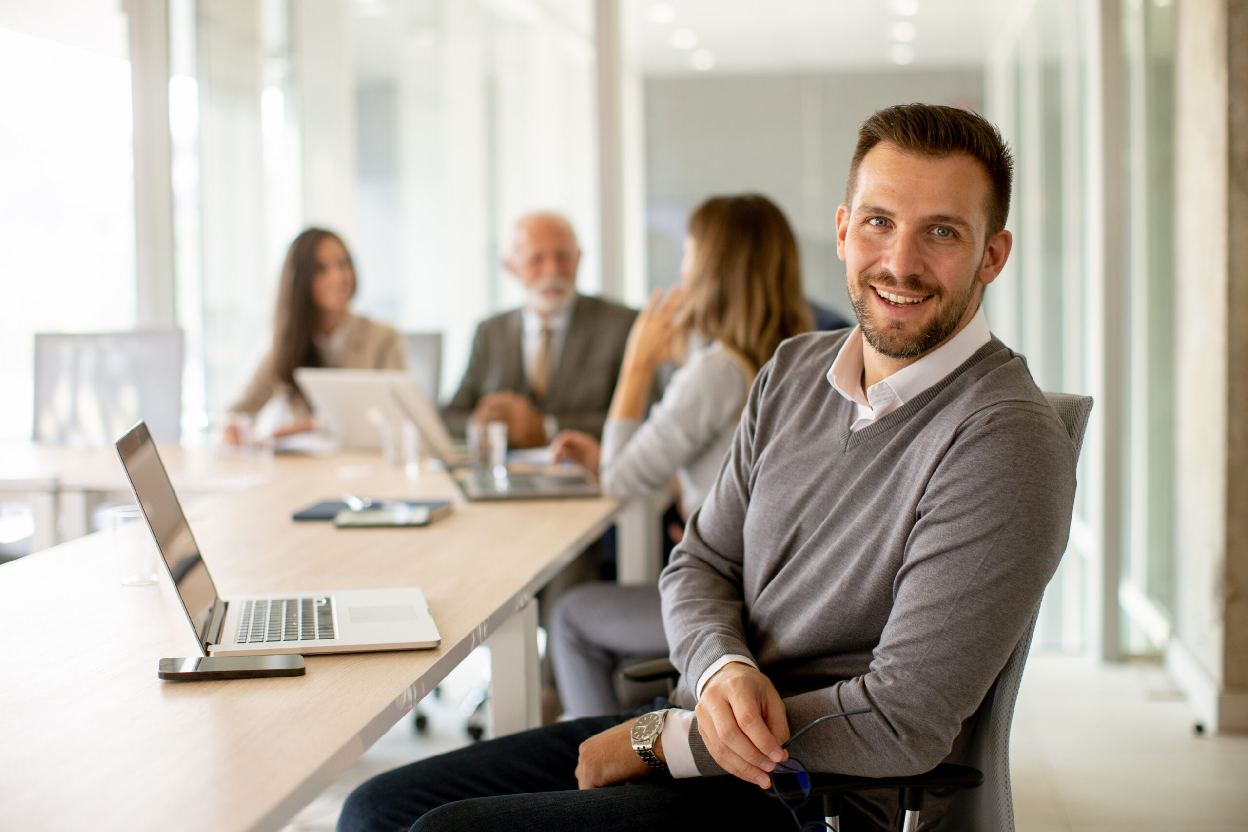 man at table posing for camera