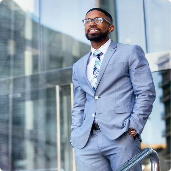 businessman posing outside for camera